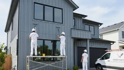 Professional siding painting on a New Orleans, LA home by expert local house painters